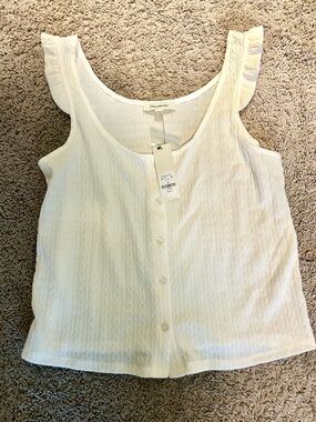 Francesca's Collections Ivory Ruffled Shoulder Button-Front Tank